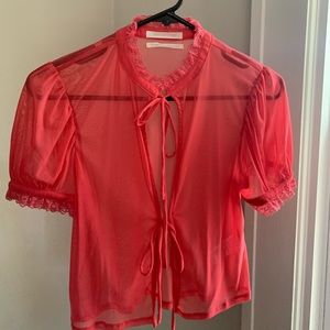 URBAN OUTFITTERS Sheer top with ties in the front